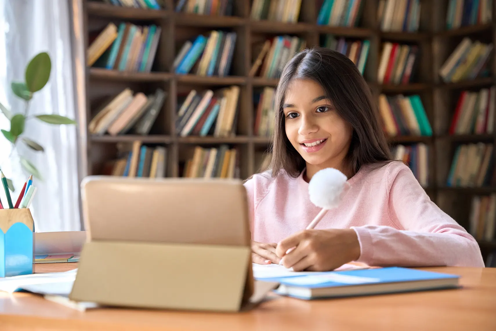 girl taking online math class